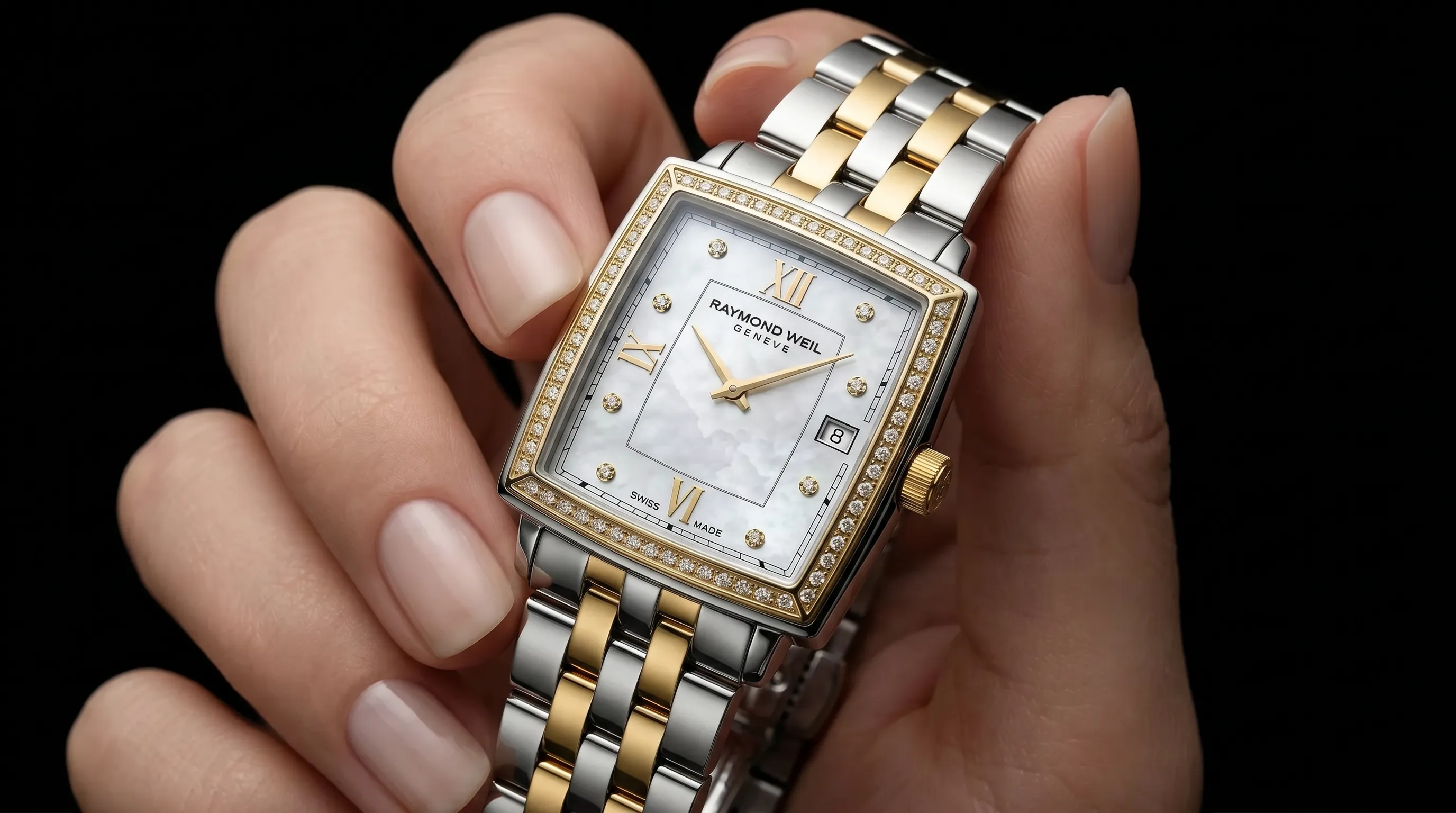 A Raymond Weil Genève two-tone watch with mother-of-pearl dial and diamond-set bezel